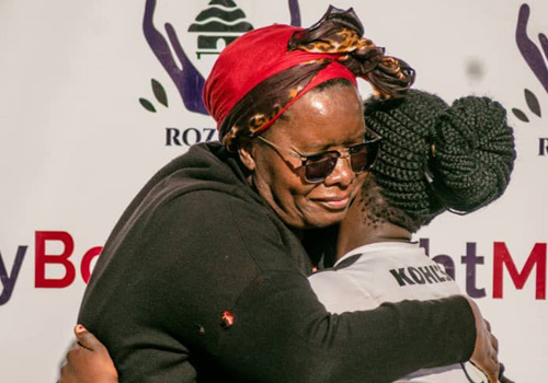 Nyaradzayi Gumbonzvanda hugging one of the RMT Soccer Tournament winners