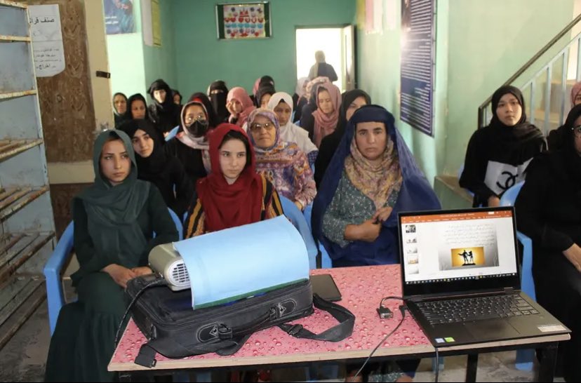 A group of women attend a meeting at the Afghan Insitute of Learning